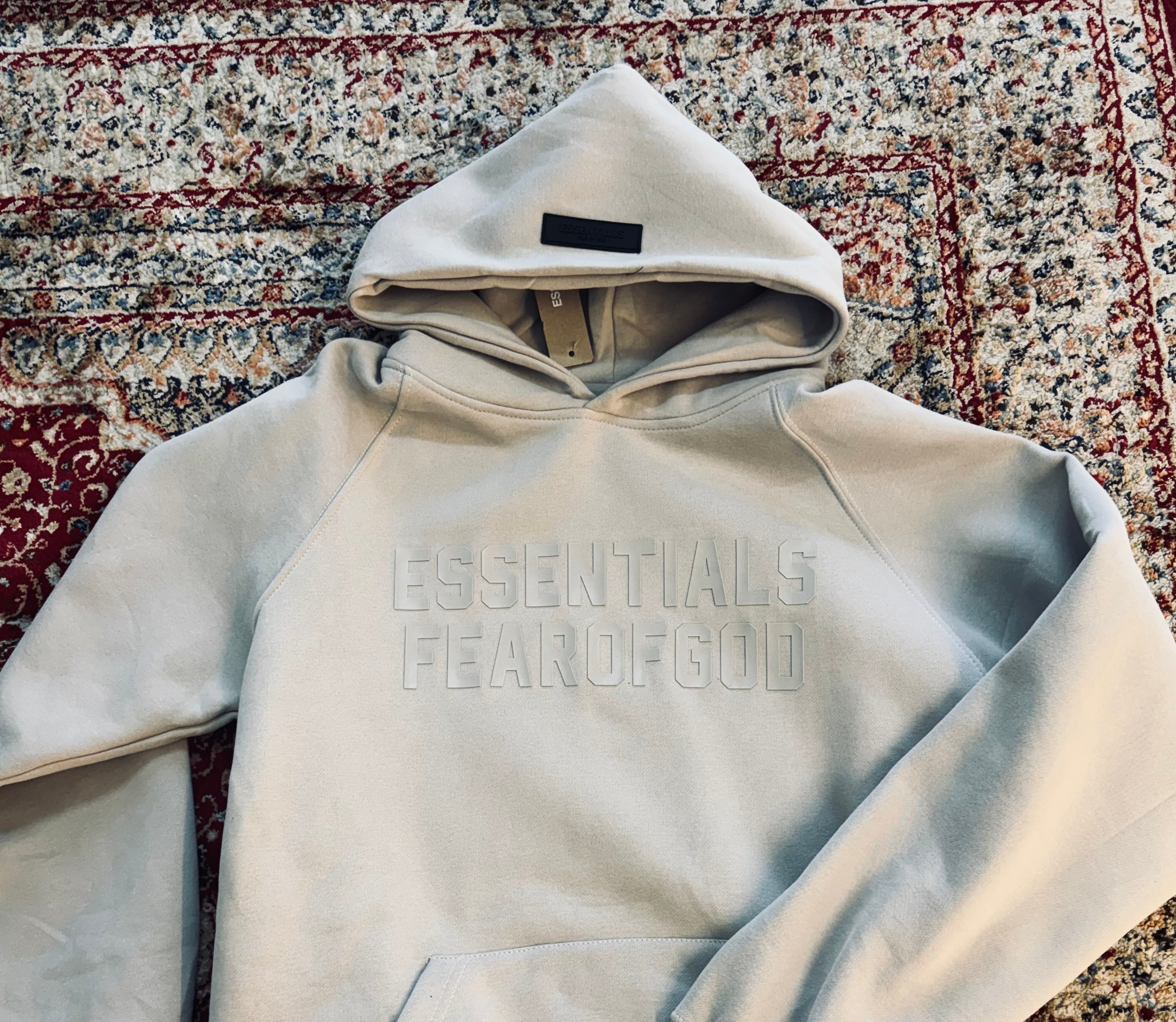 ESSENTIALS FEAR OF GOD HOODIE “LIGHT GREY”
