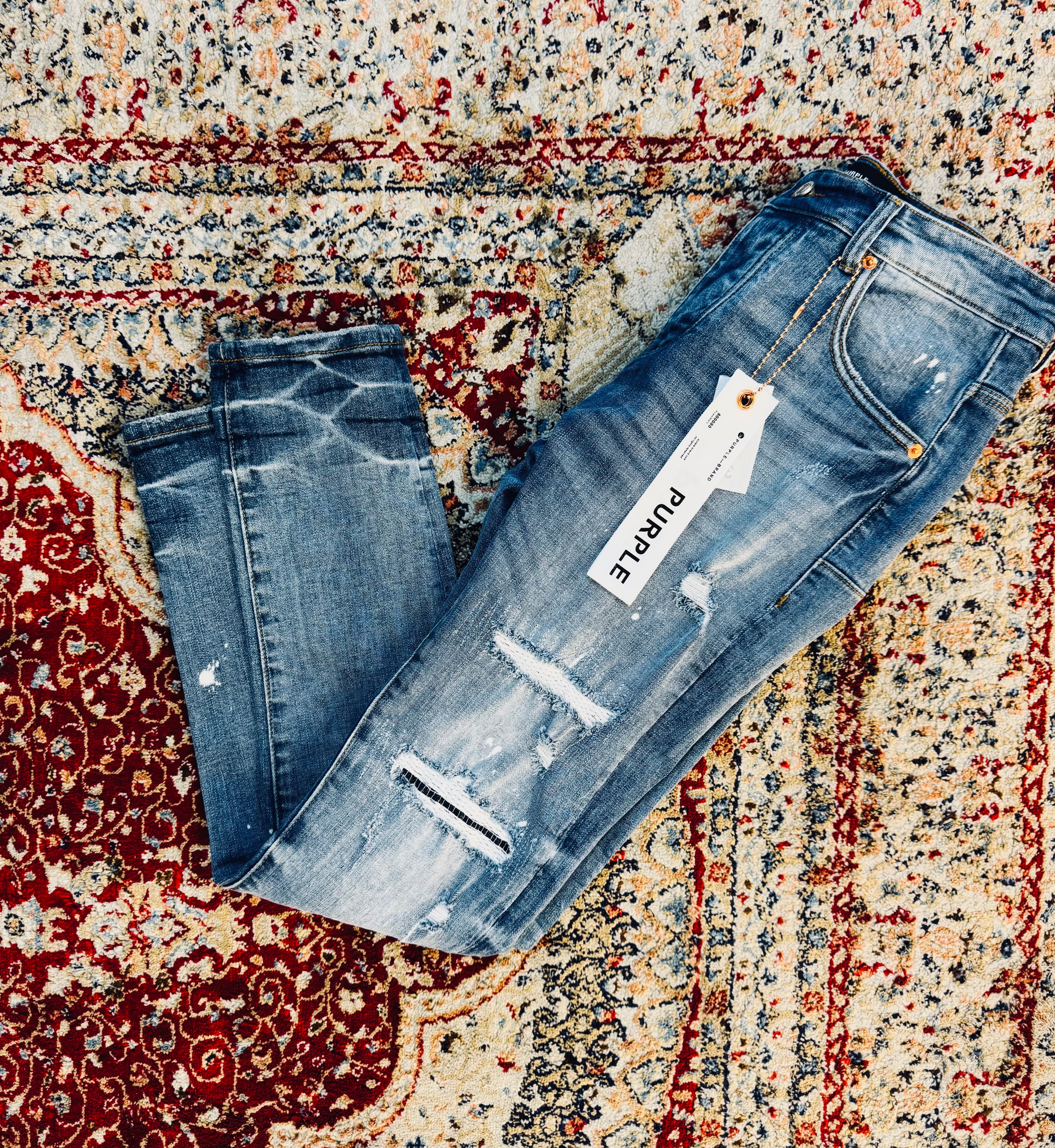 PURPLE BRAND FADED JEANS